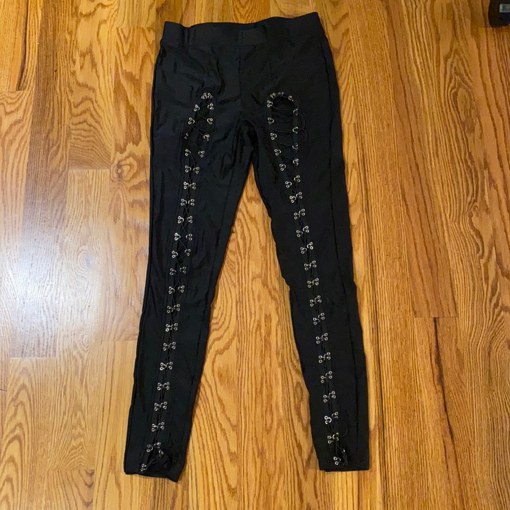 Forever 21 shiny black cross cross leggings